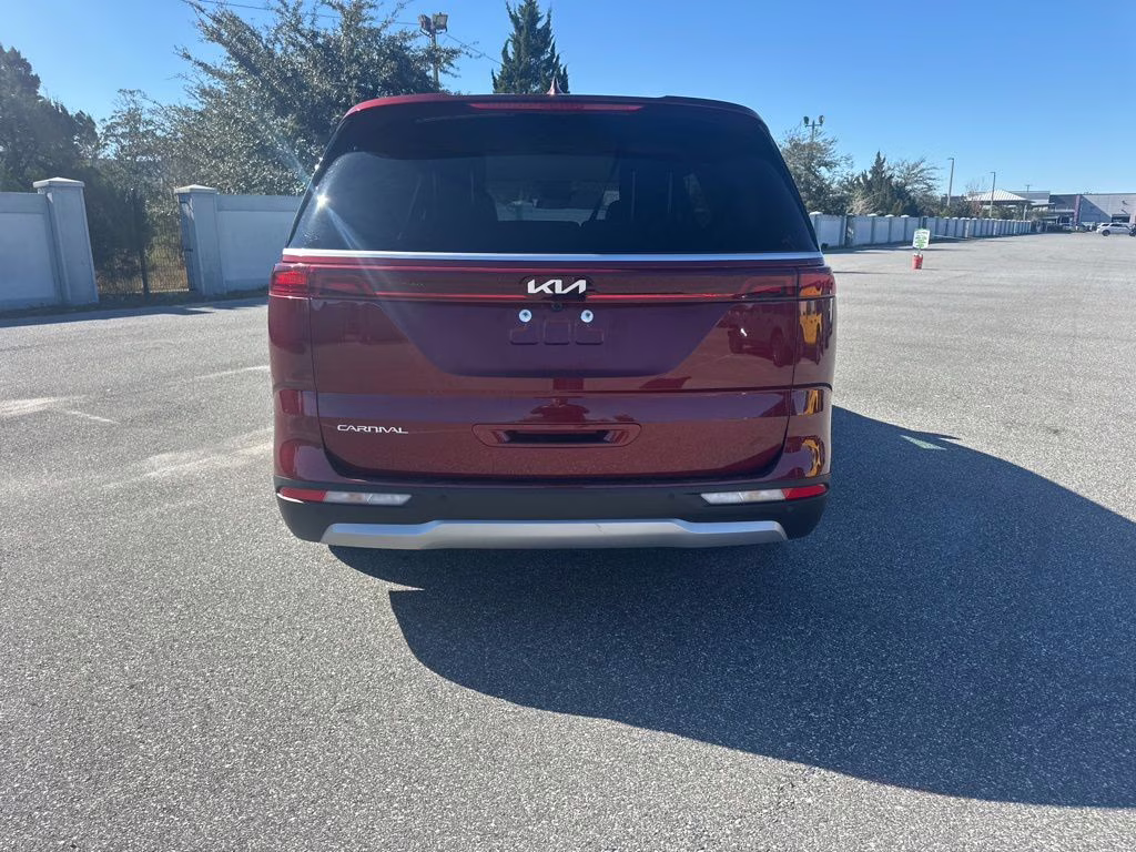 2024 Flare Red Kia Carnival LX FWD Van