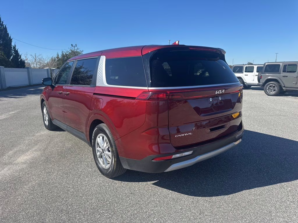 2024 Flare Red Kia Carnival LX FWD Van