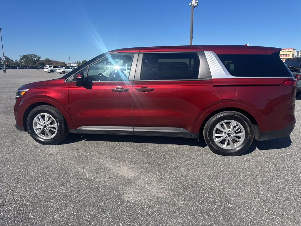 2024 Flare Red Kia Carnival LX FWD Van