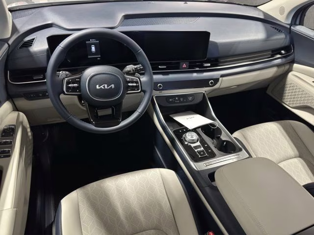 2026 Ceramic Silver Kia Carnival Hybrid EX FWD Van