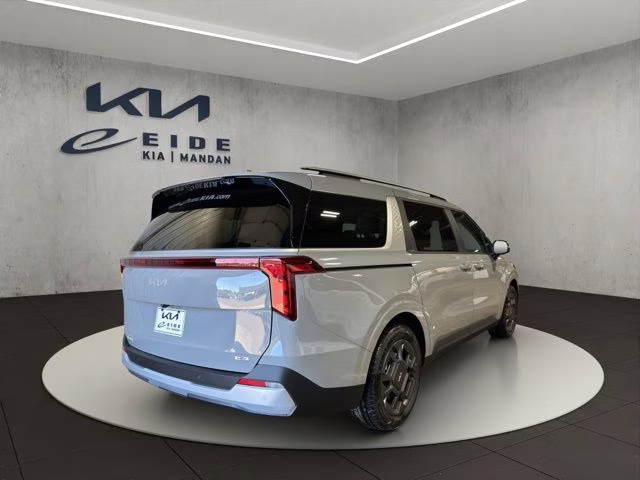 2026 Ceramic Silver Kia Carnival Hybrid EX FWD Van