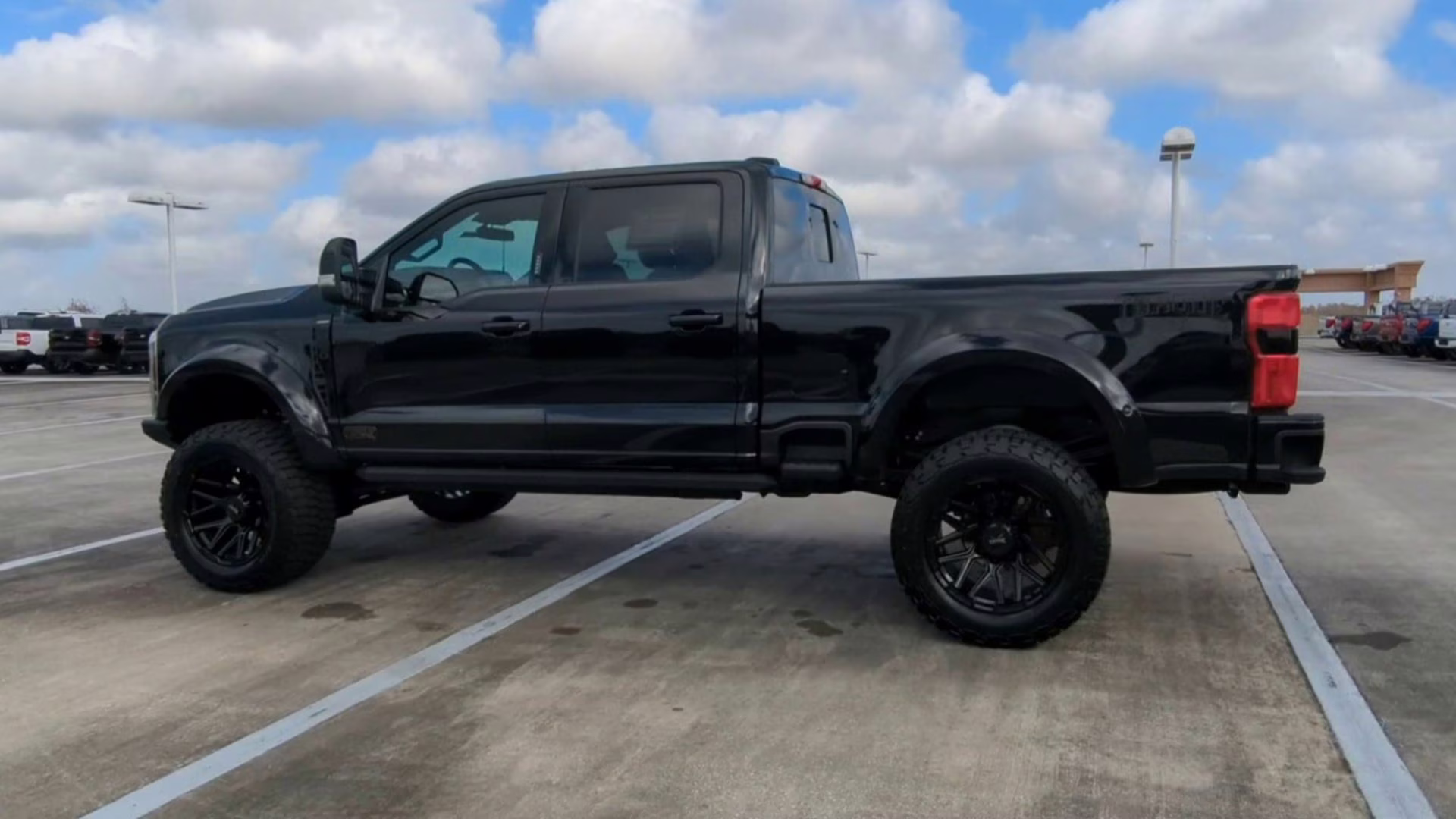 2026 Agate Black Metallic Ford Super Duty F-250 SRW LARIAT Crew Cab Pickup 4X4 Truck