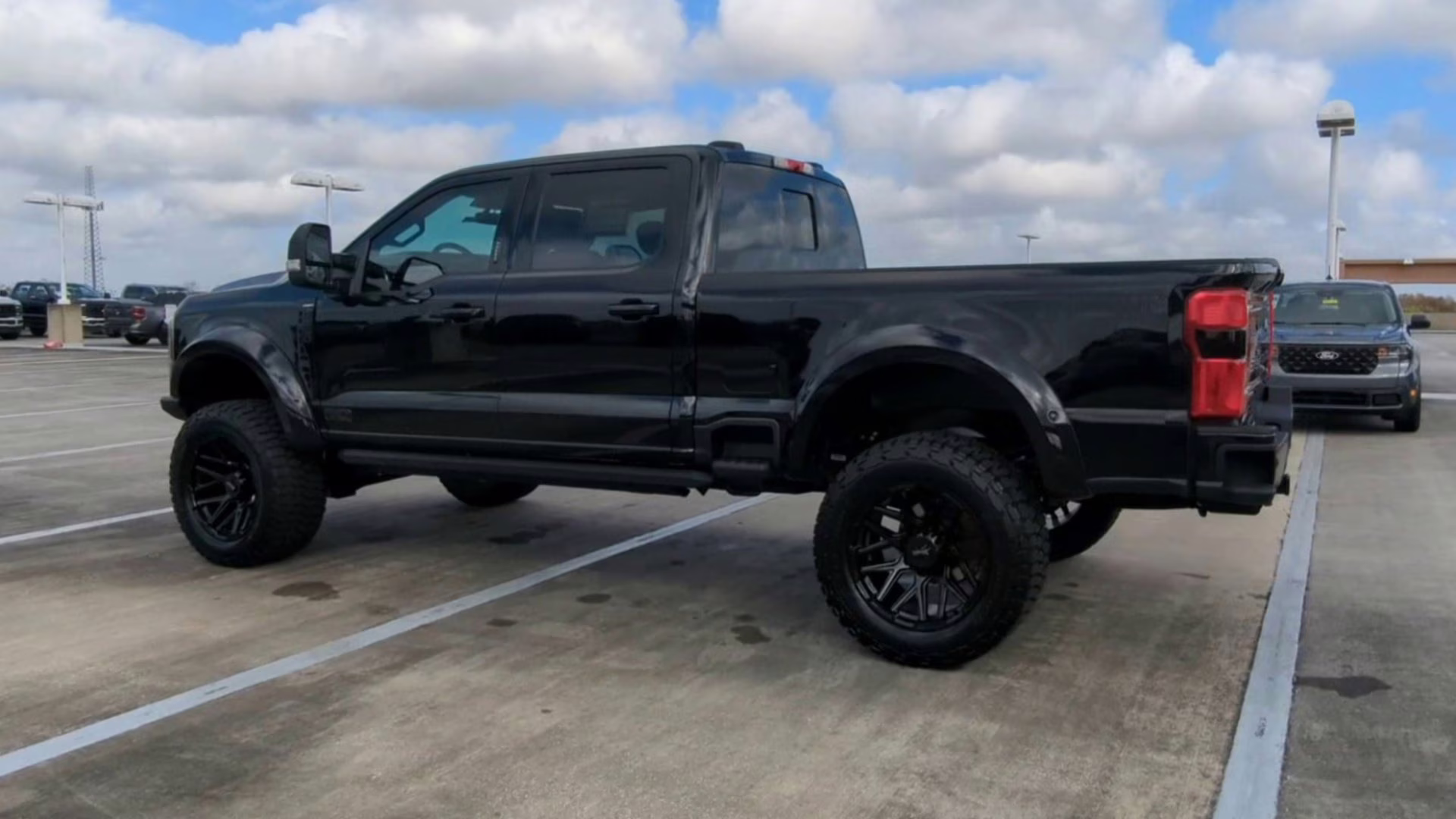 2026 Agate Black Metallic Ford Super Duty F-250 SRW LARIAT Crew Cab Pickup 4X4 Truck