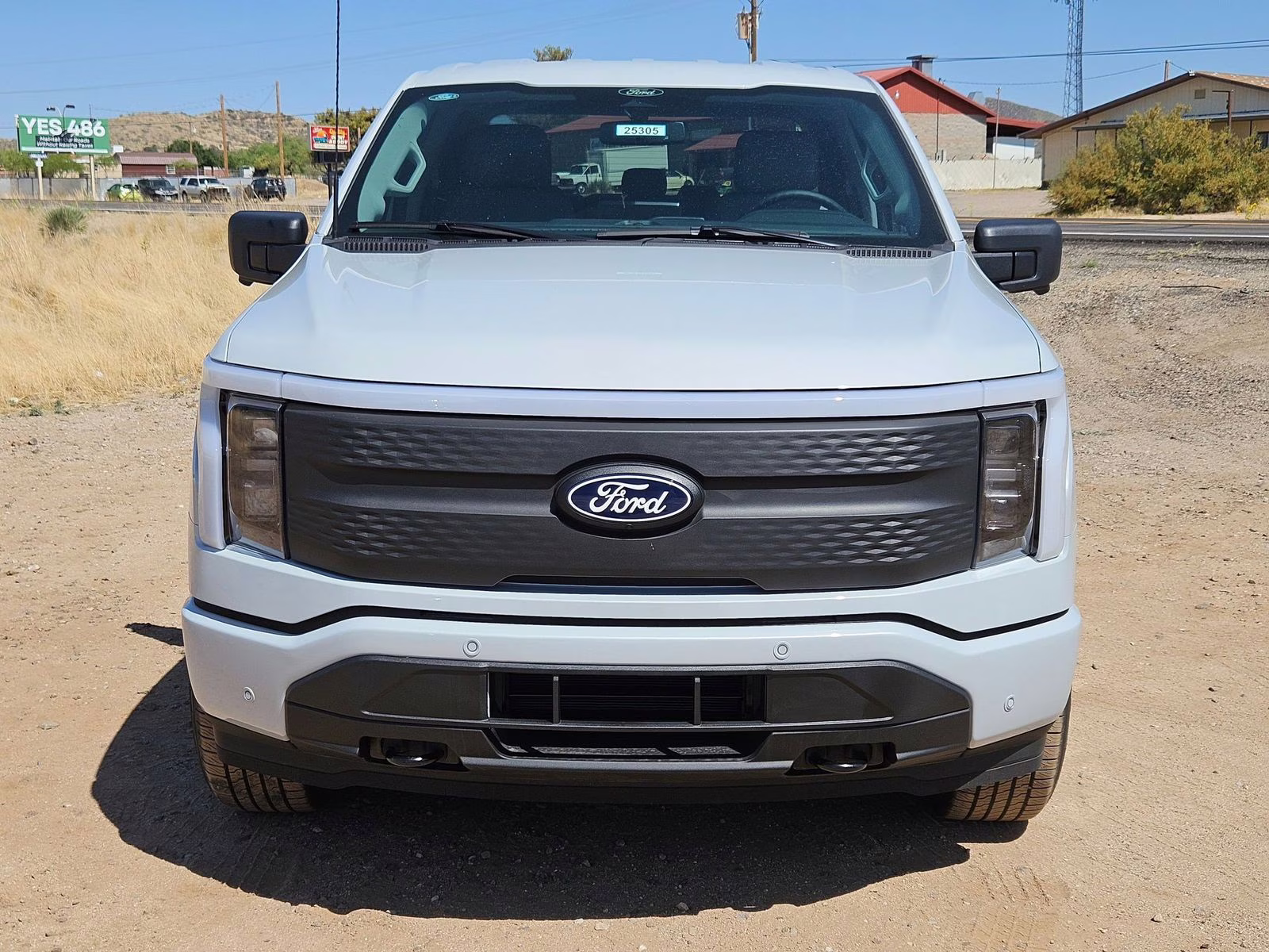 2025 White Metallic Ford F-150 Lightning Flash AWD Truck