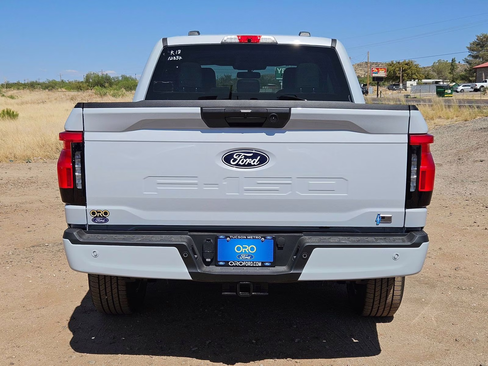 2025 White Metallic Ford F-150 Lightning Flash AWD Truck