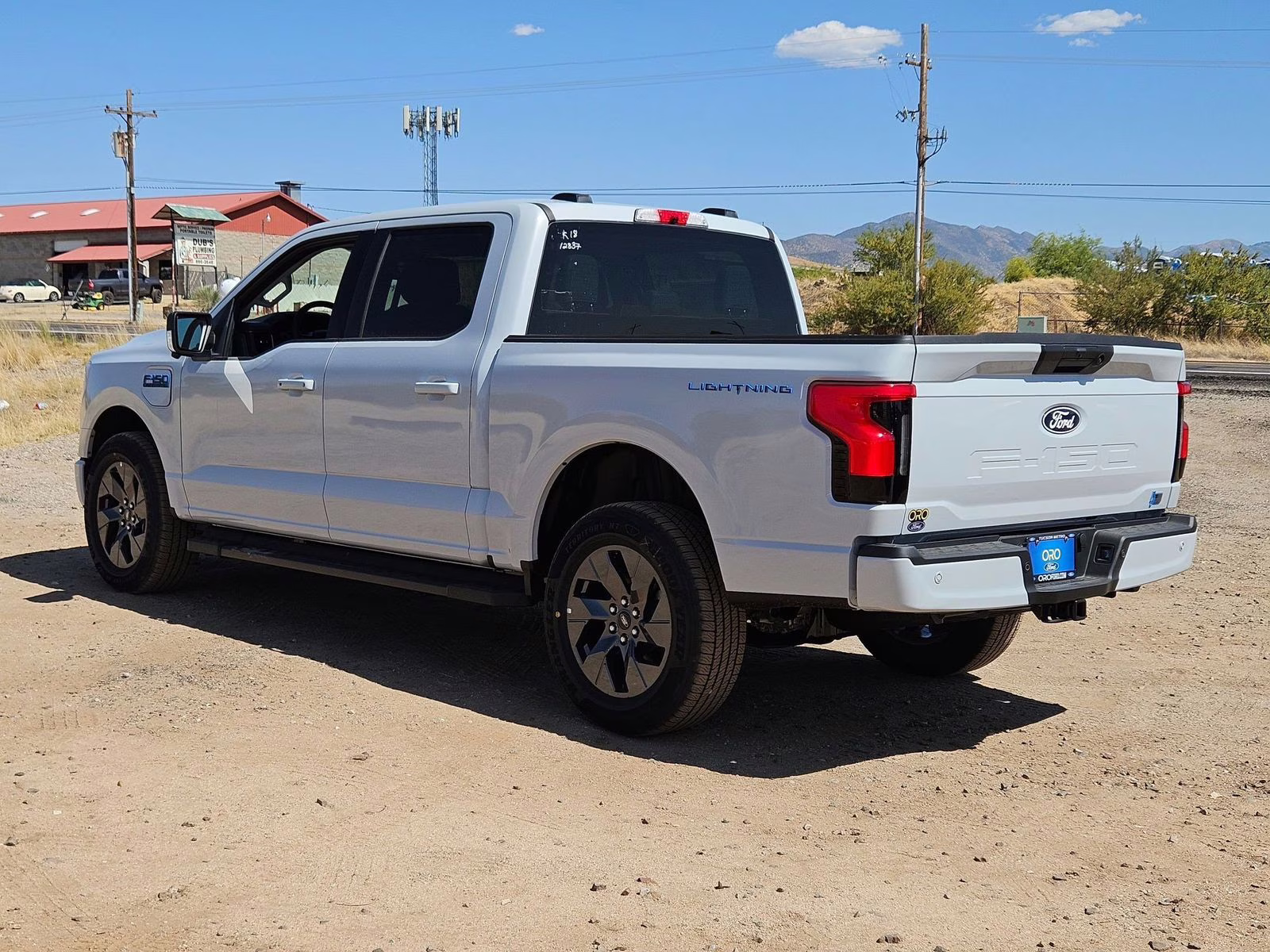 2025 White Metallic Ford F-150 Lightning Flash AWD Truck