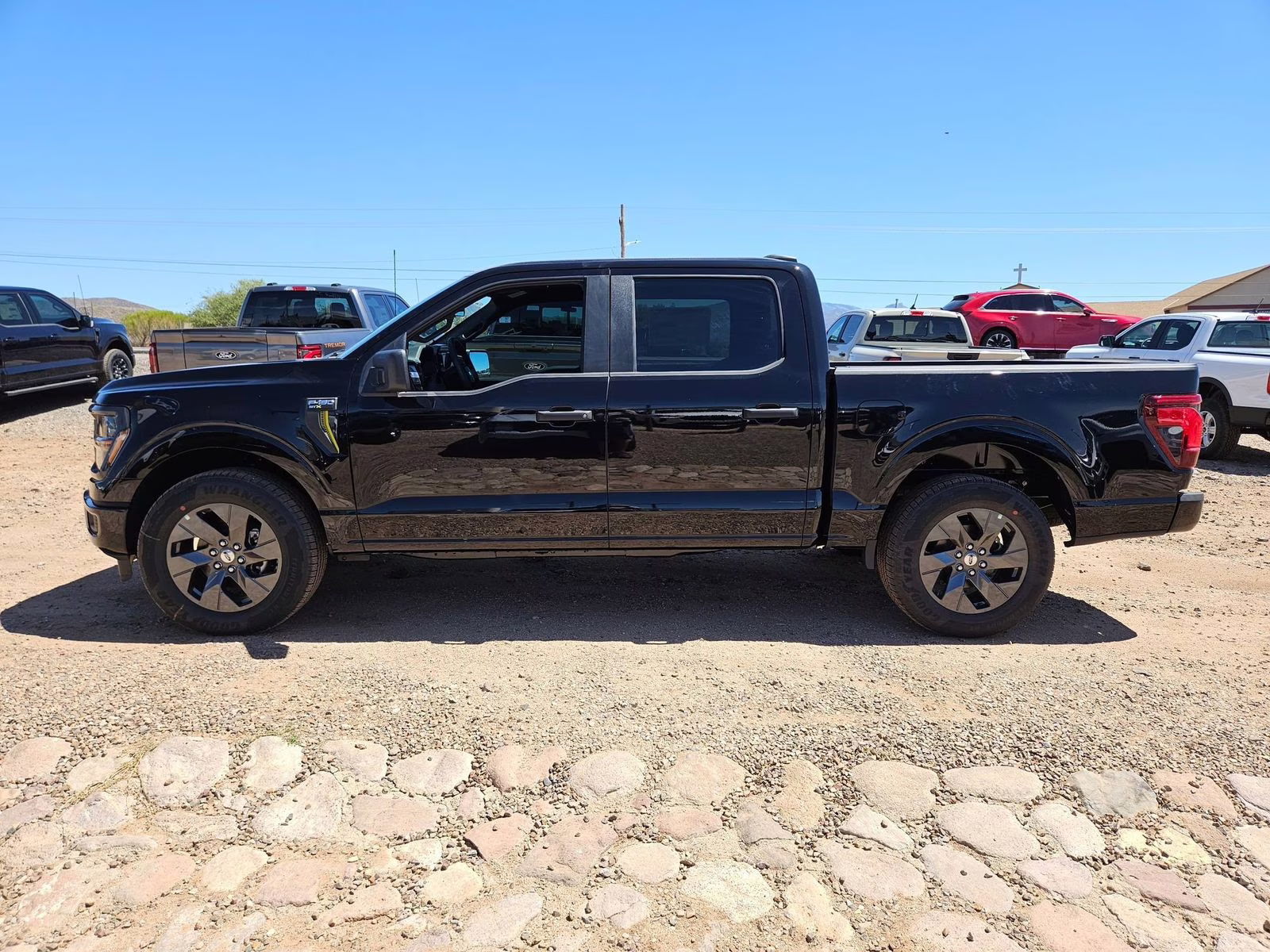 2025 Black Metallic Ford F-150 STX RWD Truck