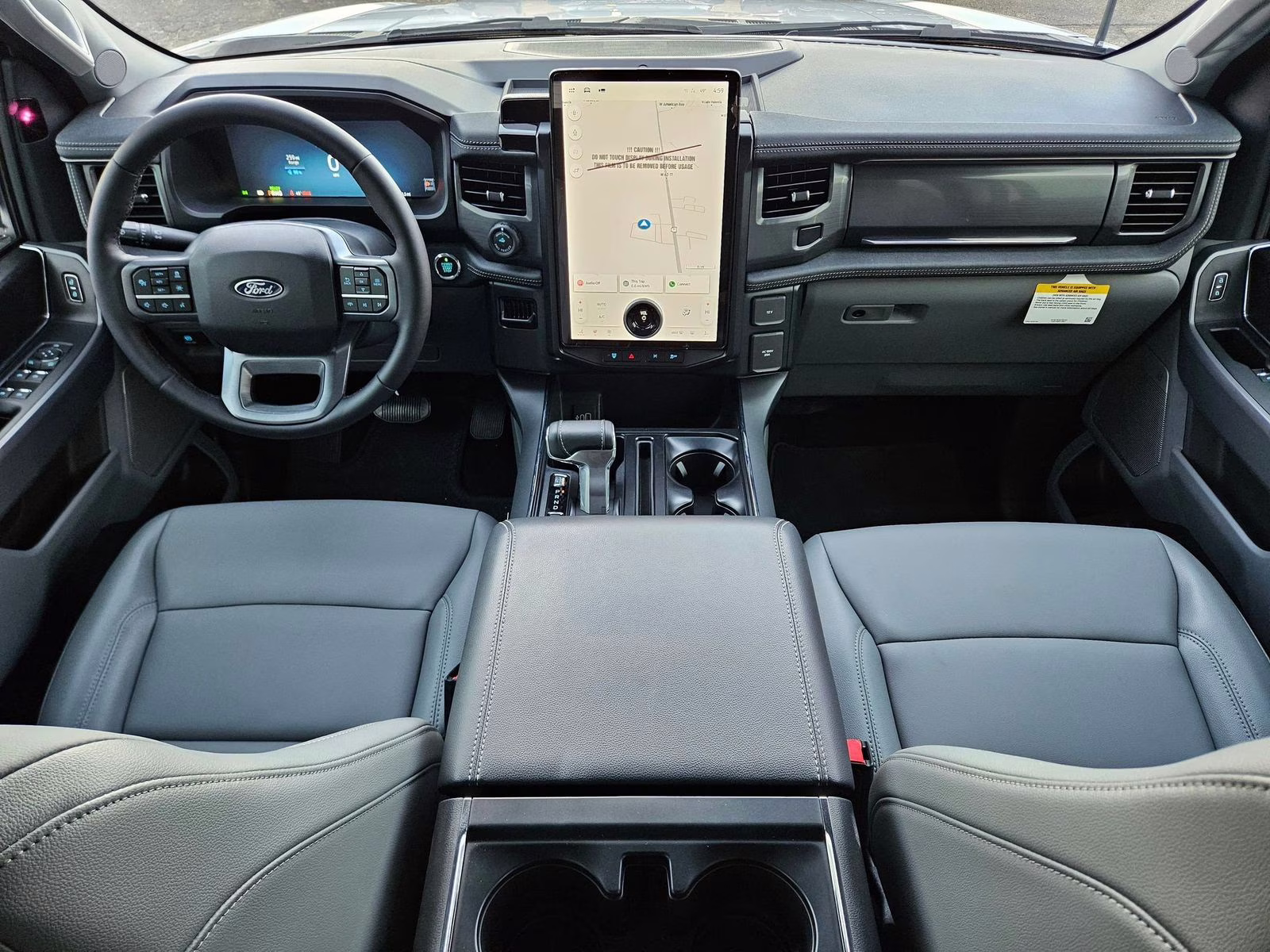 2025 White Metallic Ford F-150 Lightning Flash AWD Truck