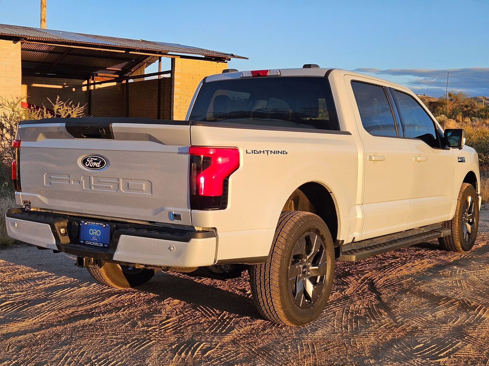 2025 White Metallic Ford F-150 Lightning Flash AWD Truck