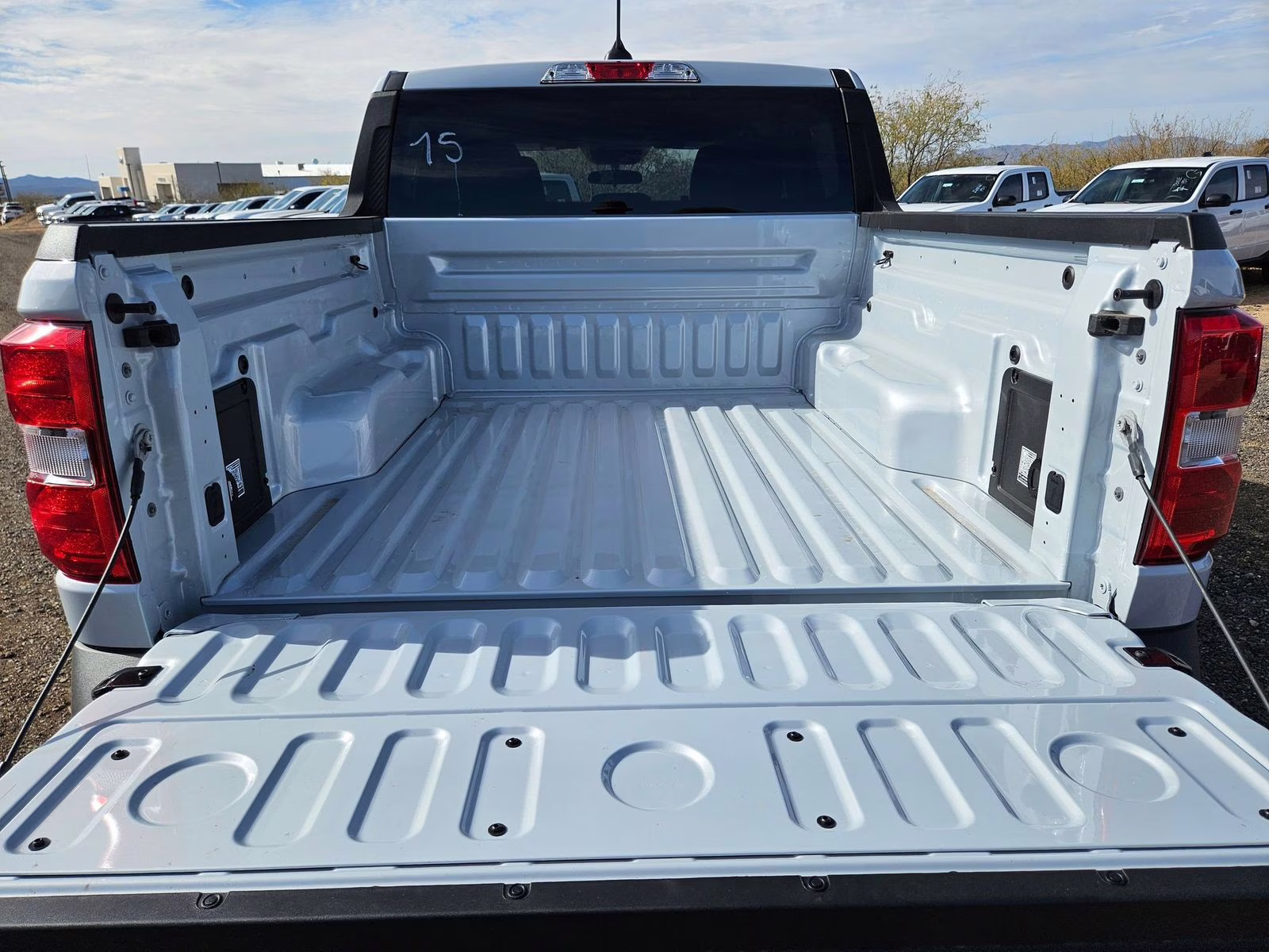 2026 White Metallic Ford Maverick XL AWD Truck