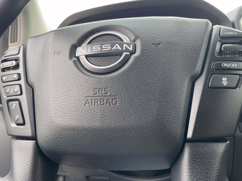 2026 Glacier White Nissan Frontier SV 4X4 Truck