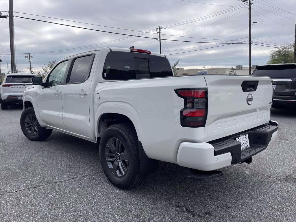 2026 Glacier White Nissan Frontier SV 4X4 Truck