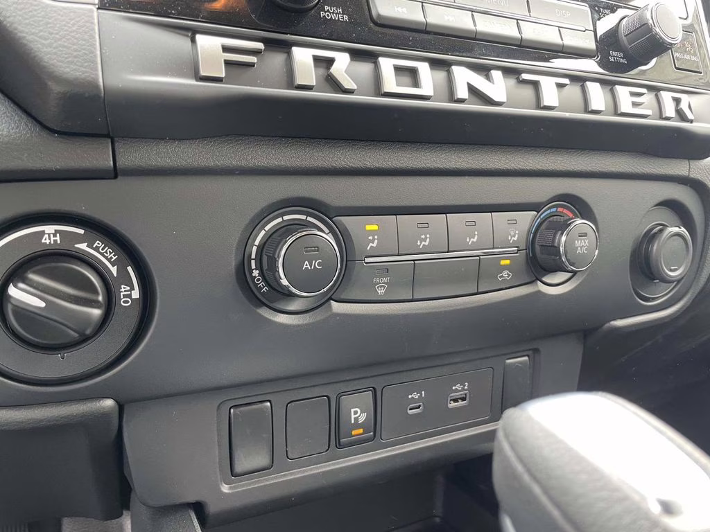 2026 Glacier White Nissan Frontier SV 4X4 Truck