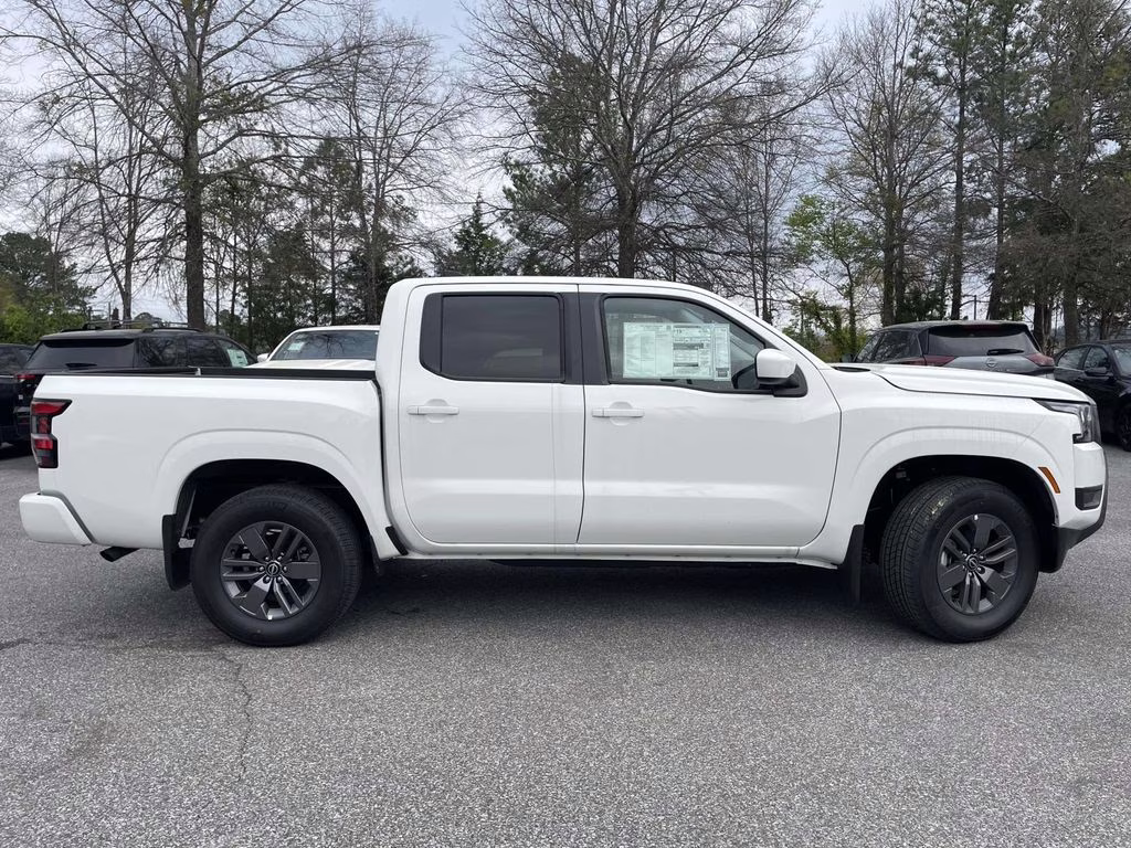 2026 Glacier White Nissan Frontier SV 4X4 Truck