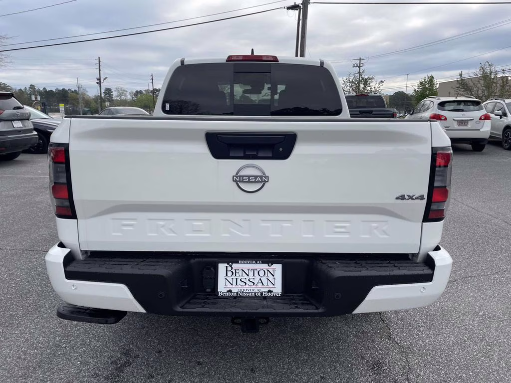 2026 Glacier White Nissan Frontier SV 4X4 Truck