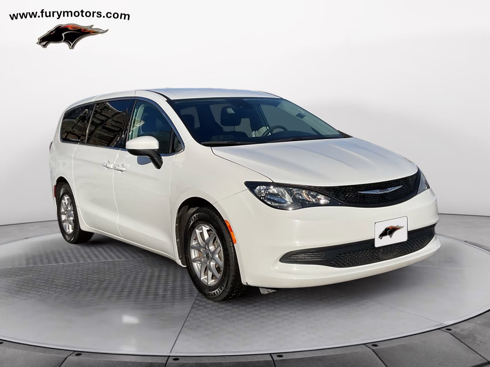 2023 Bright White Clearcoat Chrysler Voyager LX FWD Van