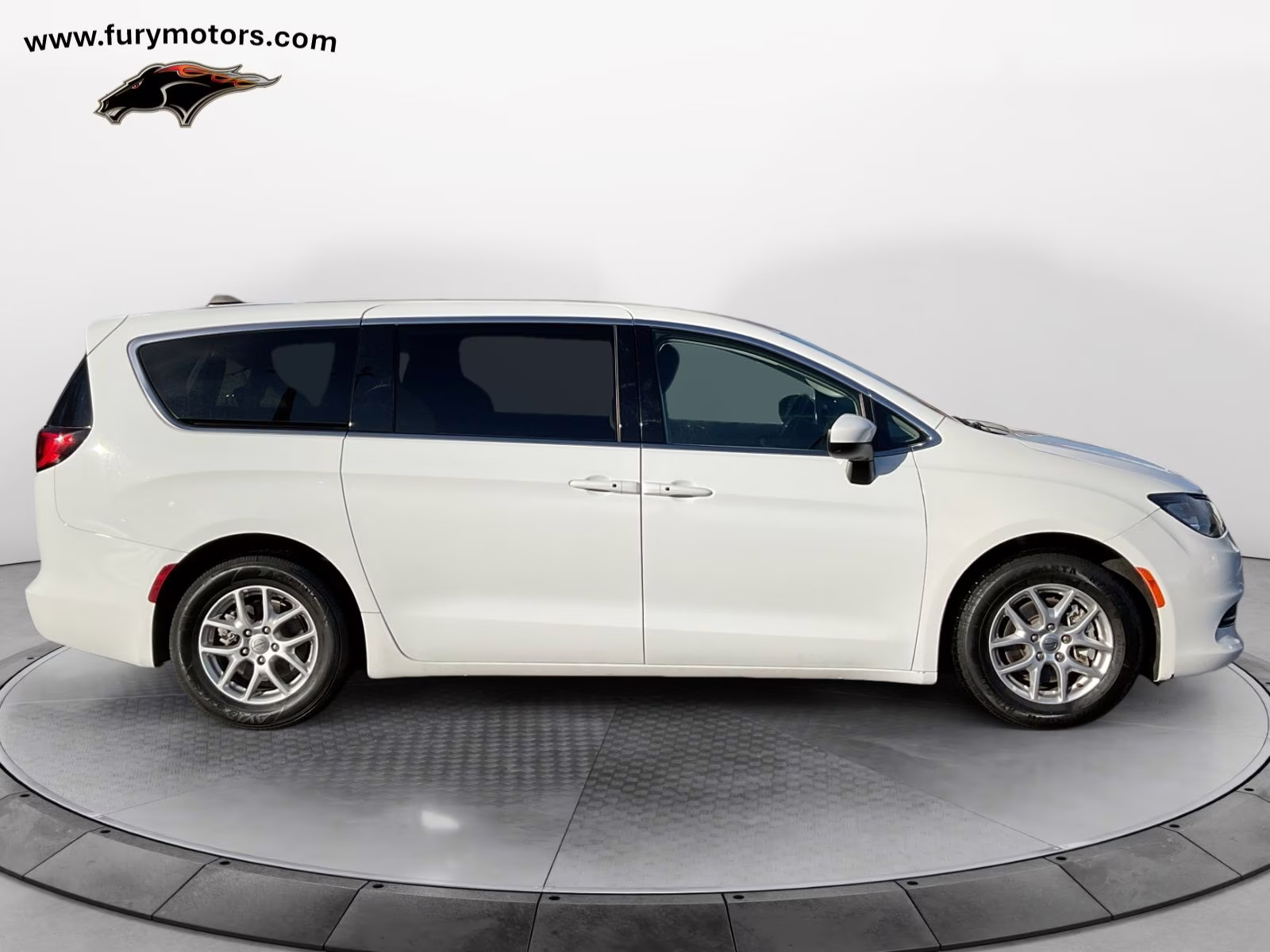 2023 Bright White Clearcoat Chrysler Voyager LX FWD Van