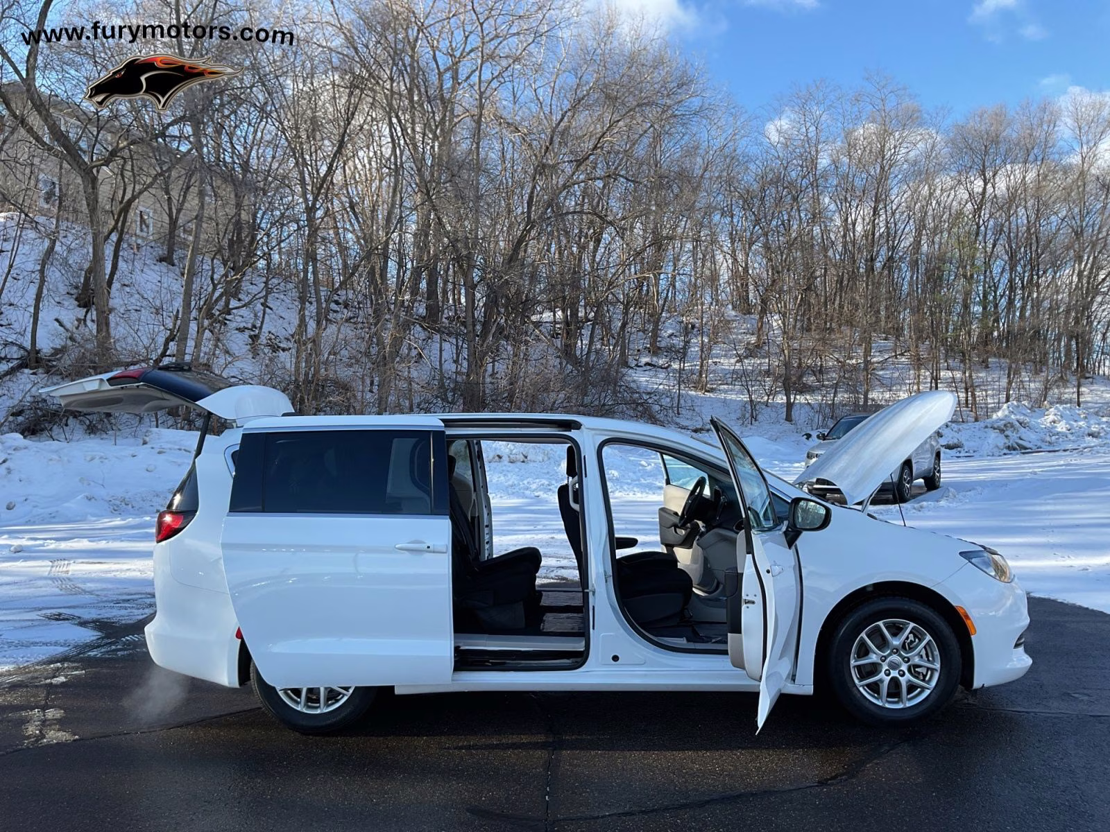 2023 Bright White Clearcoat Chrysler Voyager LX FWD Van