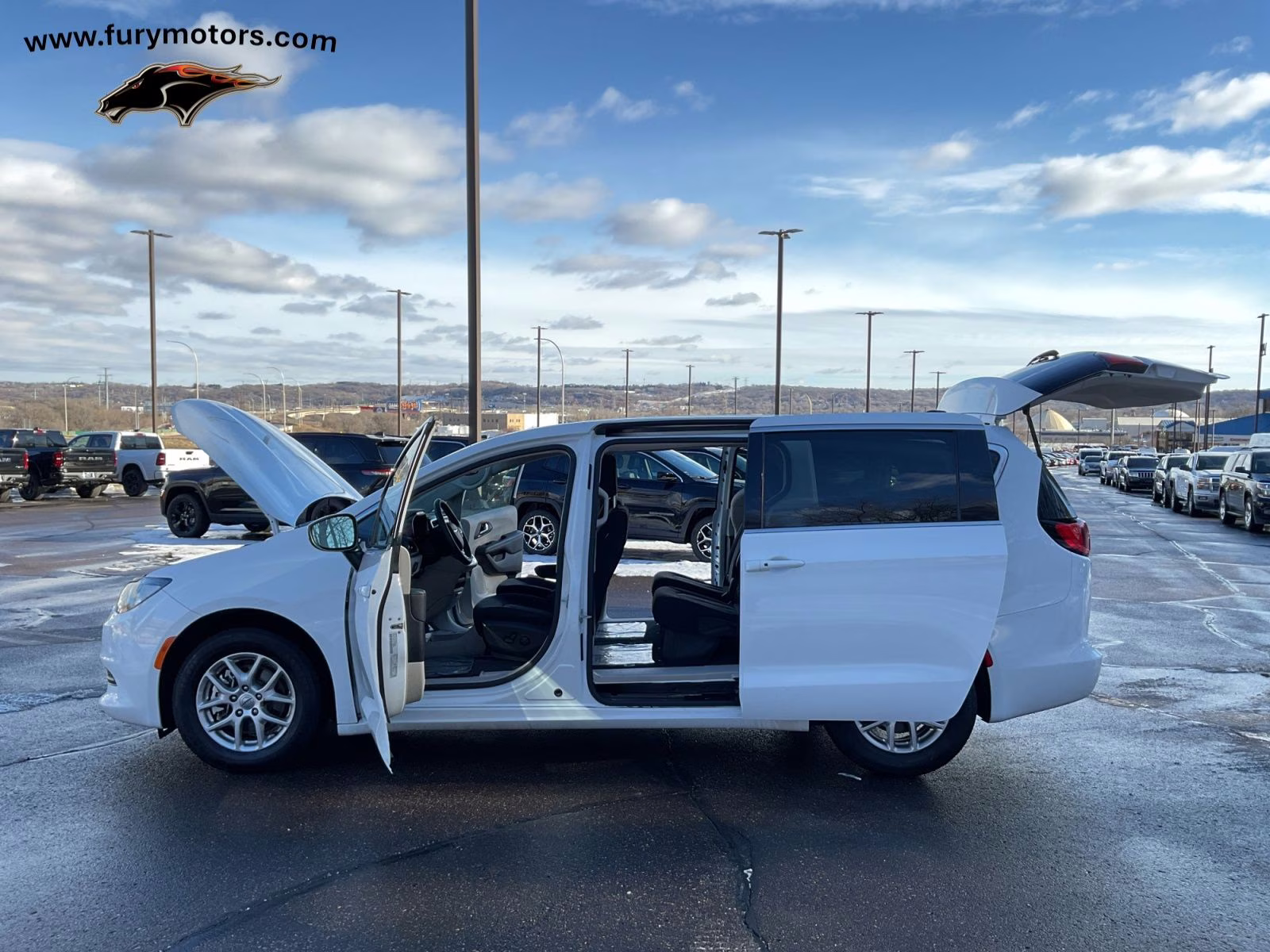 2023 Bright White Clearcoat Chrysler Voyager LX FWD Van