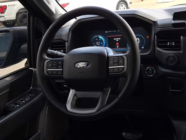 2025 Black Metallic Ford F-150 Lightning Flash AWD Truck