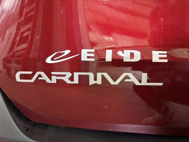 2026 Flare Red Kia Carnival Hybrid LXS FWD Van