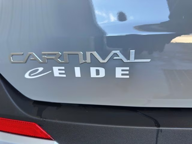2026 Ceramic Silver Kia Carnival Hybrid EX FWD Van