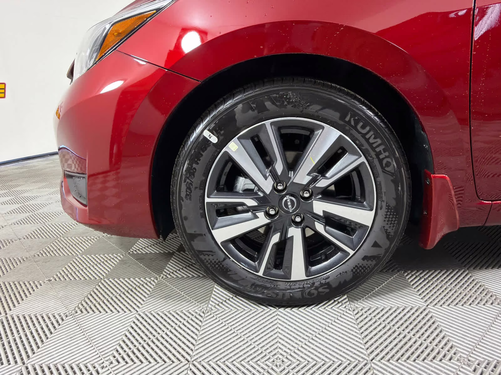 2025 Scarlet Ember Tintcoat Nissan Versa SV FWD Sedan