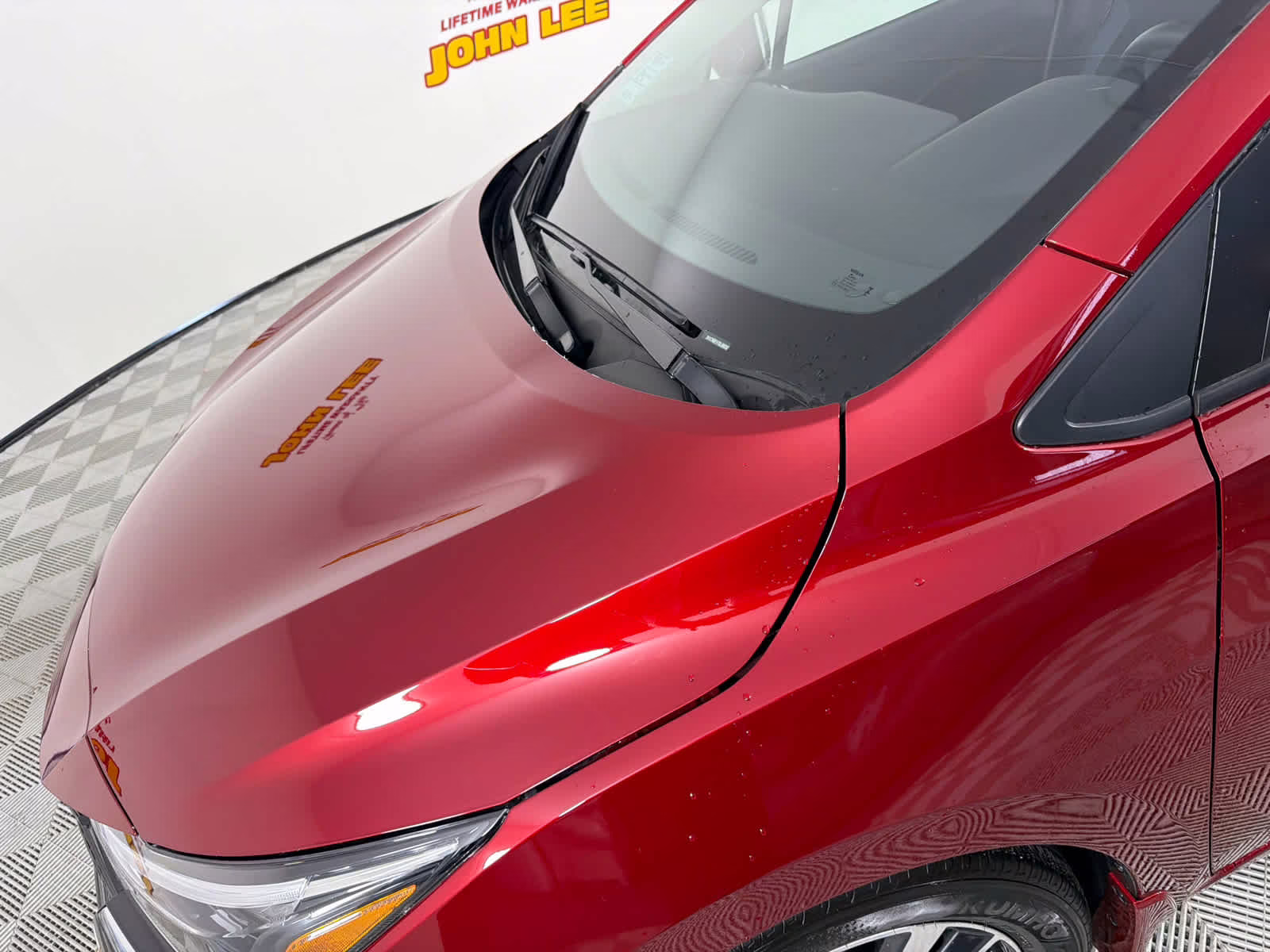 2025 Scarlet Ember Tintcoat Nissan Versa SV FWD Sedan