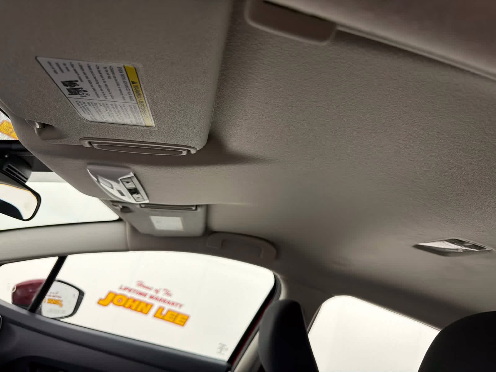 2025 Scarlet Ember Tintcoat Nissan Versa SV FWD Sedan