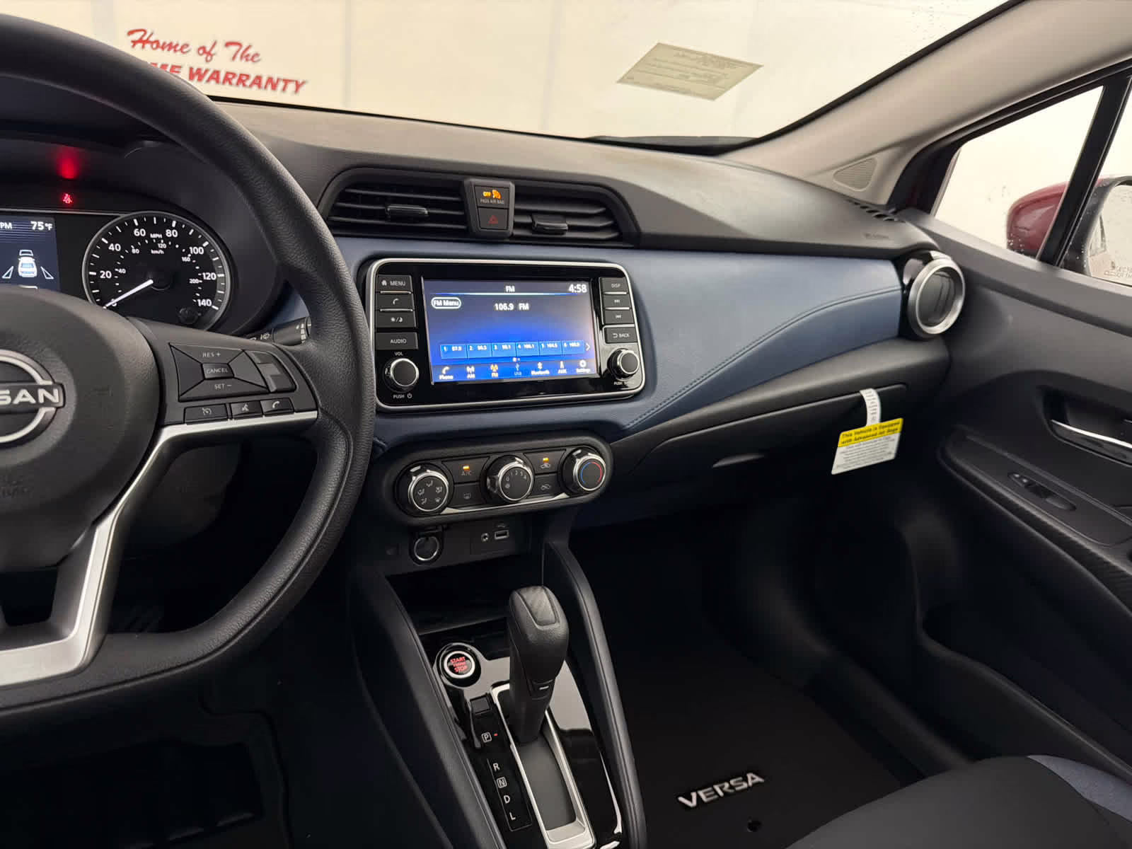 2025 Scarlet Ember Tintcoat Nissan Versa SV FWD Sedan