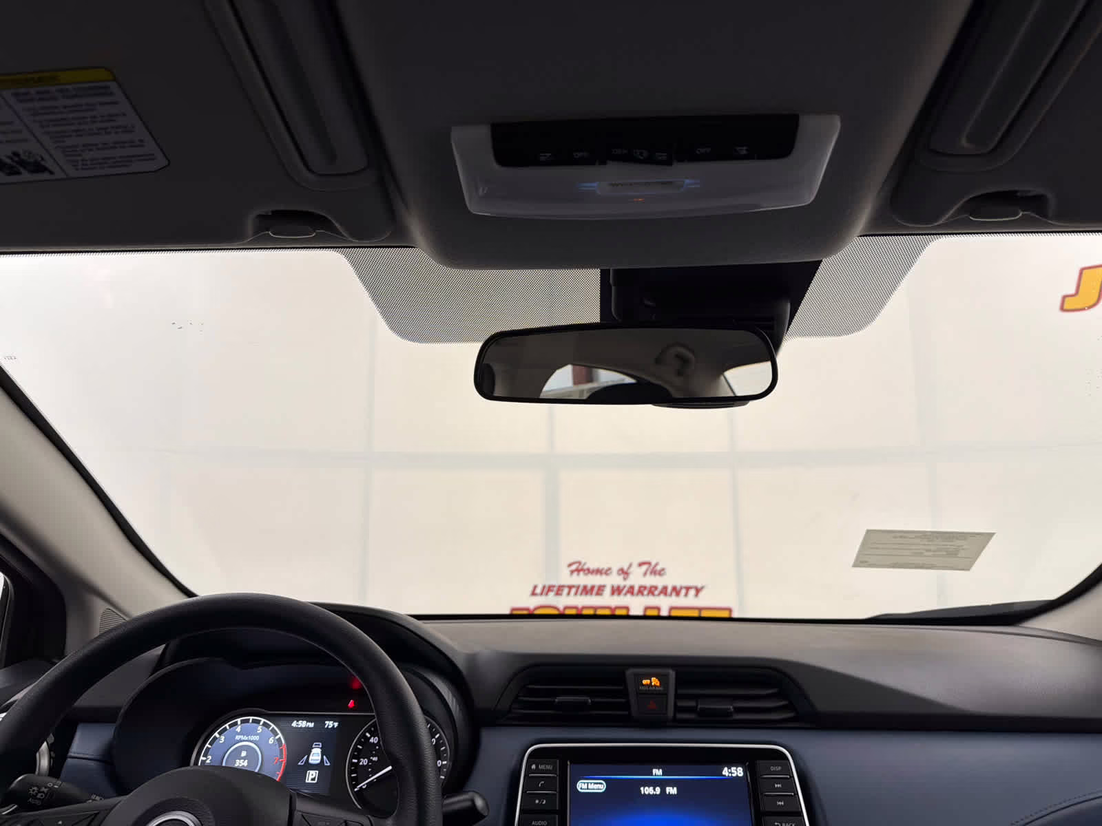 2025 Scarlet Ember Tintcoat Nissan Versa SV FWD Sedan