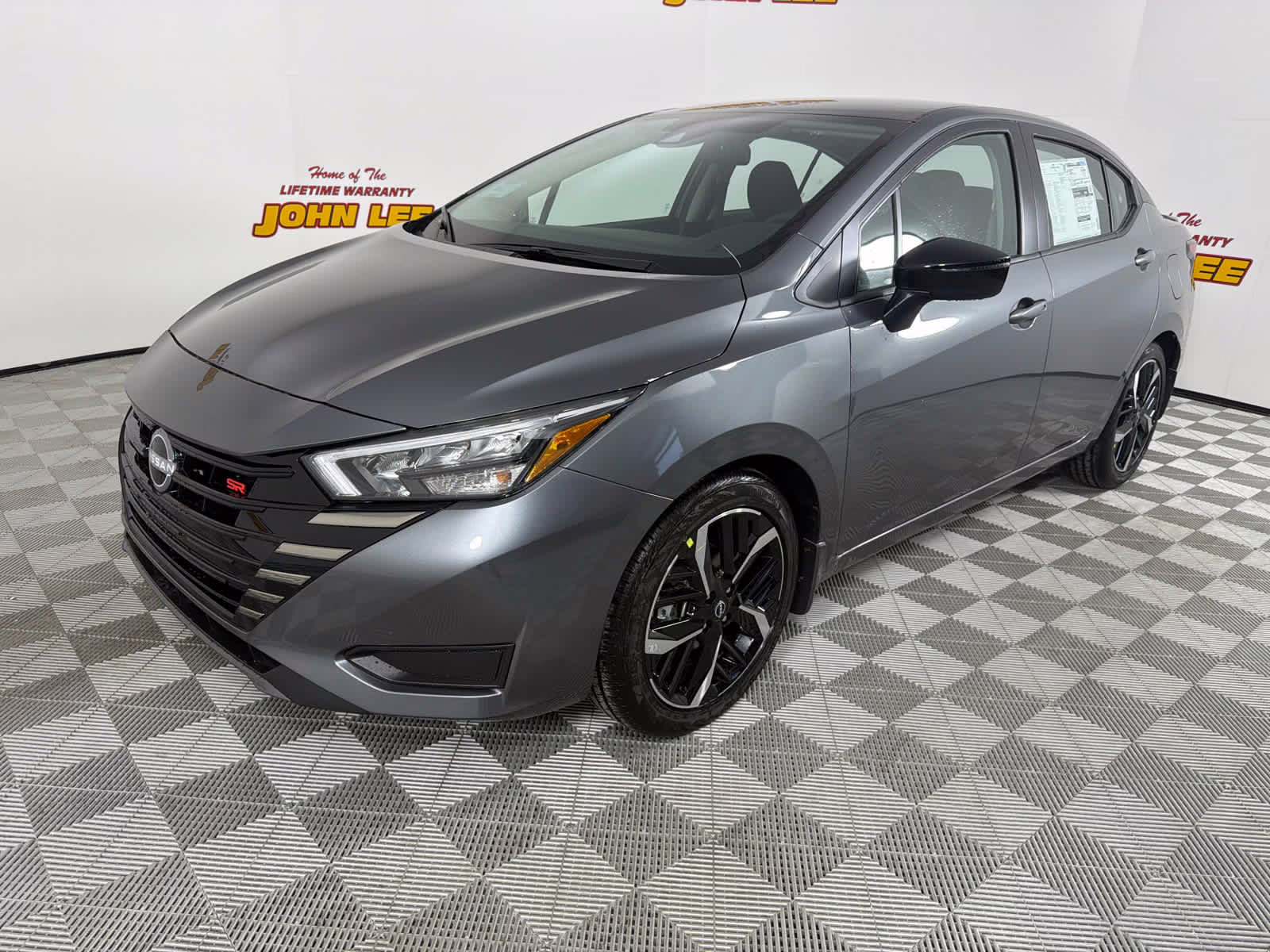 2025 Gun Metallic Nissan Versa SR FWD Sedan