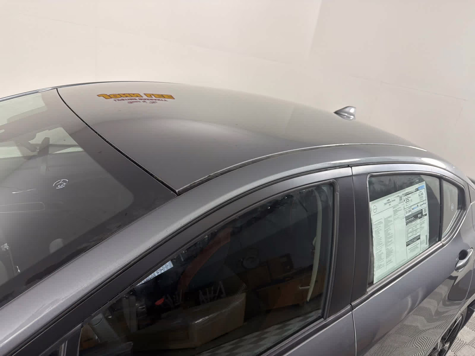 2025 Gun Metallic Nissan Versa SR FWD Sedan