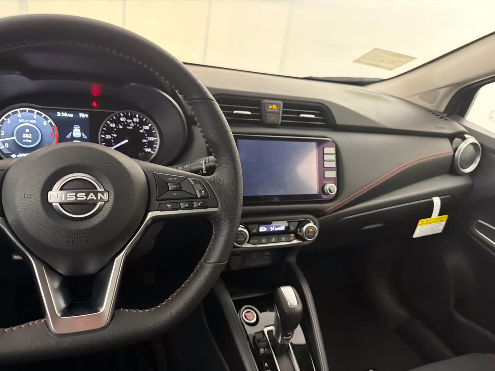 2025 Gun Metallic Nissan Versa SR FWD Sedan