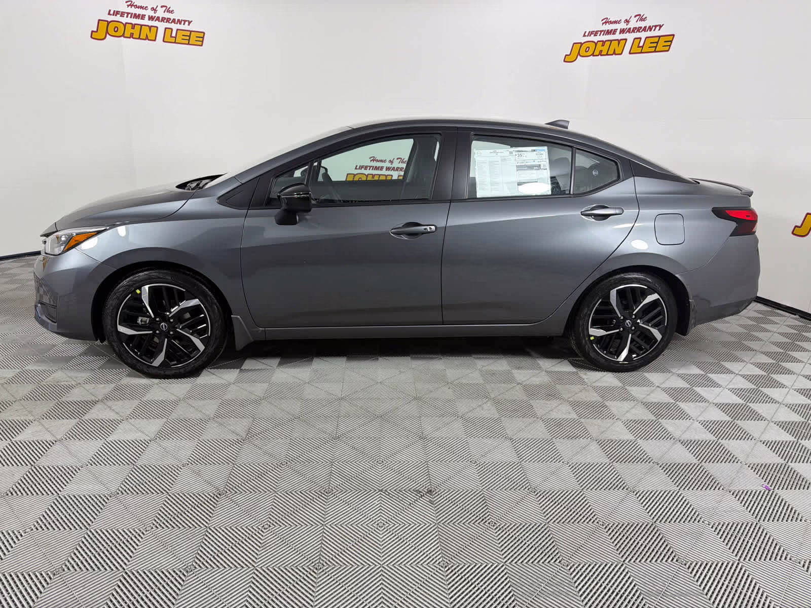 2025 Gun Metallic Nissan Versa SR FWD Sedan