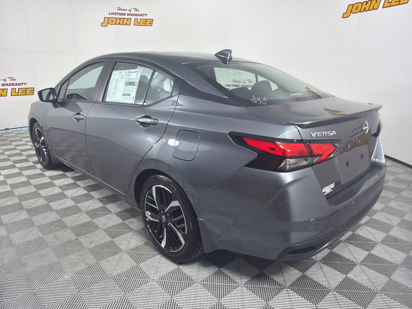 2025 Gun Metallic Nissan Versa SR FWD Sedan