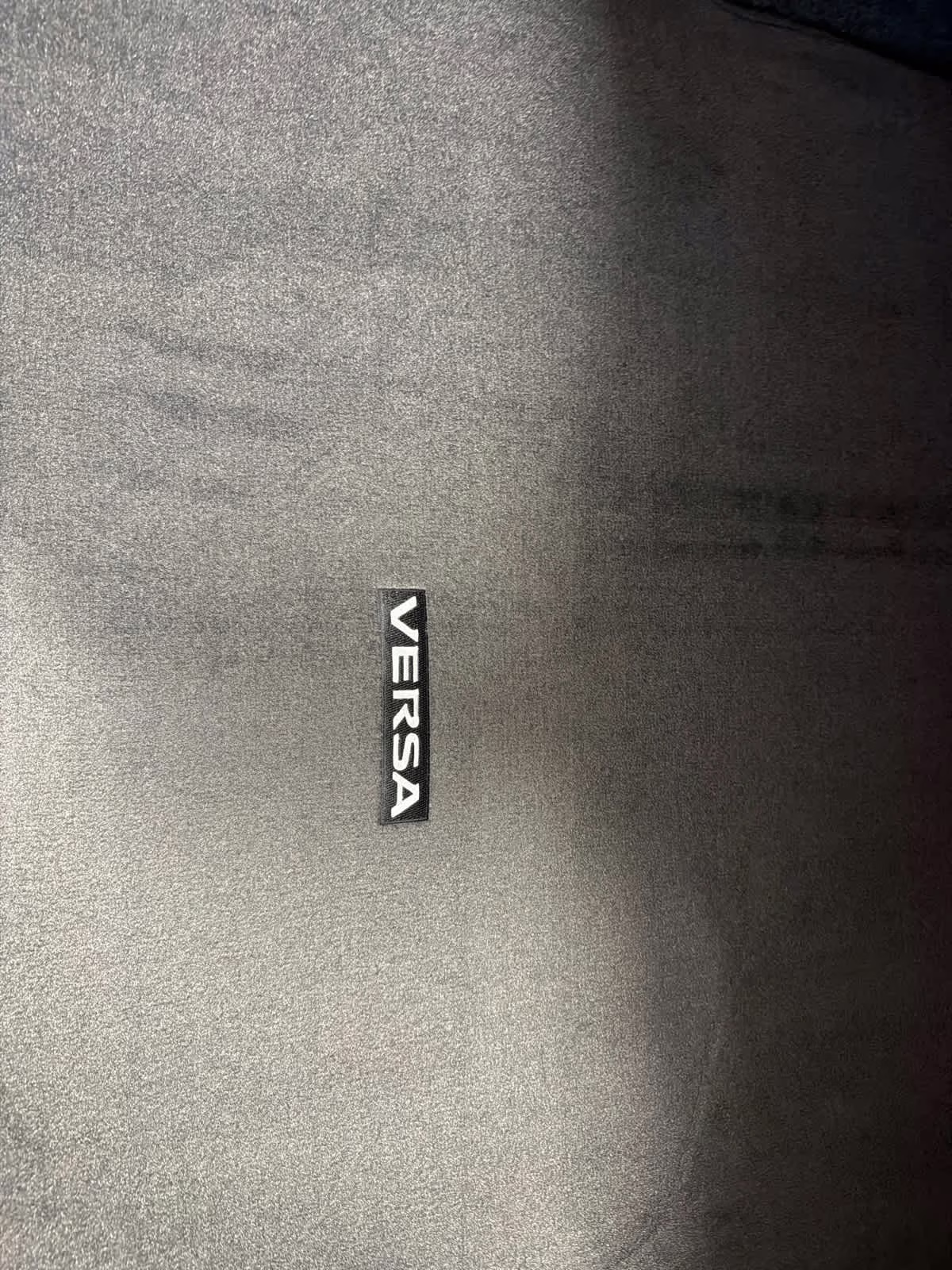 2025 Gun Metallic Nissan Versa SR FWD Sedan