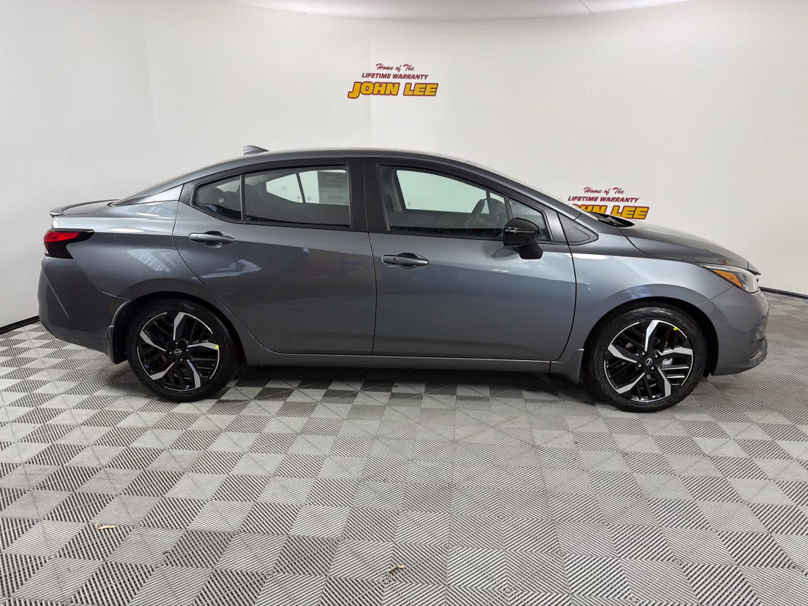 2025 Gun Metallic Nissan Versa SR FWD Sedan