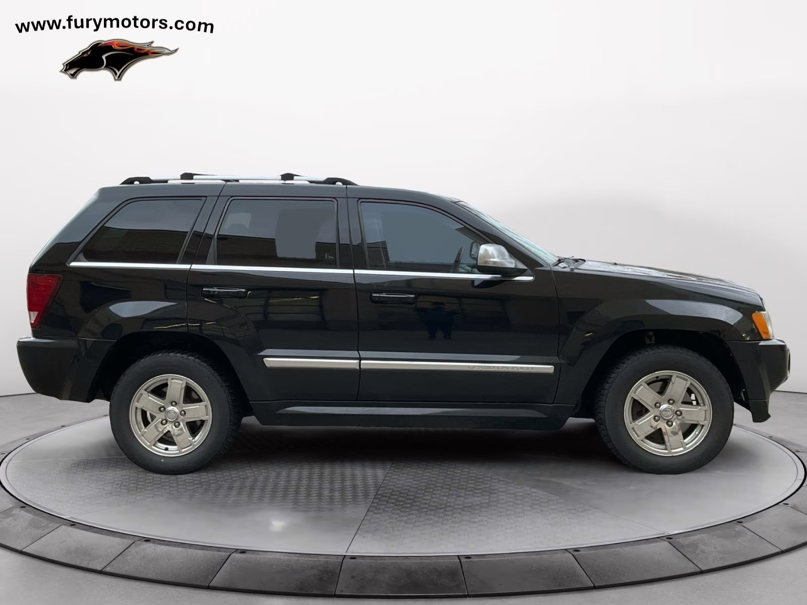 Used 2006 Jeep Grand Cherokee Overland with VIN 1J8HR68246C306698 for sale in Forest Lake, MN