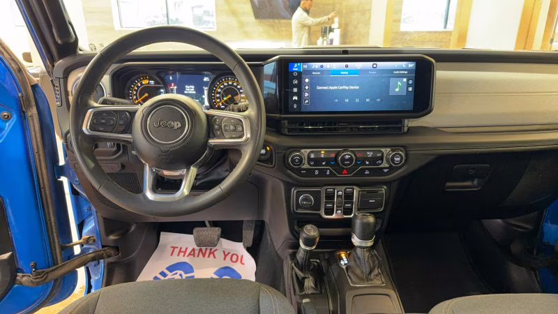 2024 Blue Jeep Wrangler 4 Door Sahara Sport Utility 4D 4X4