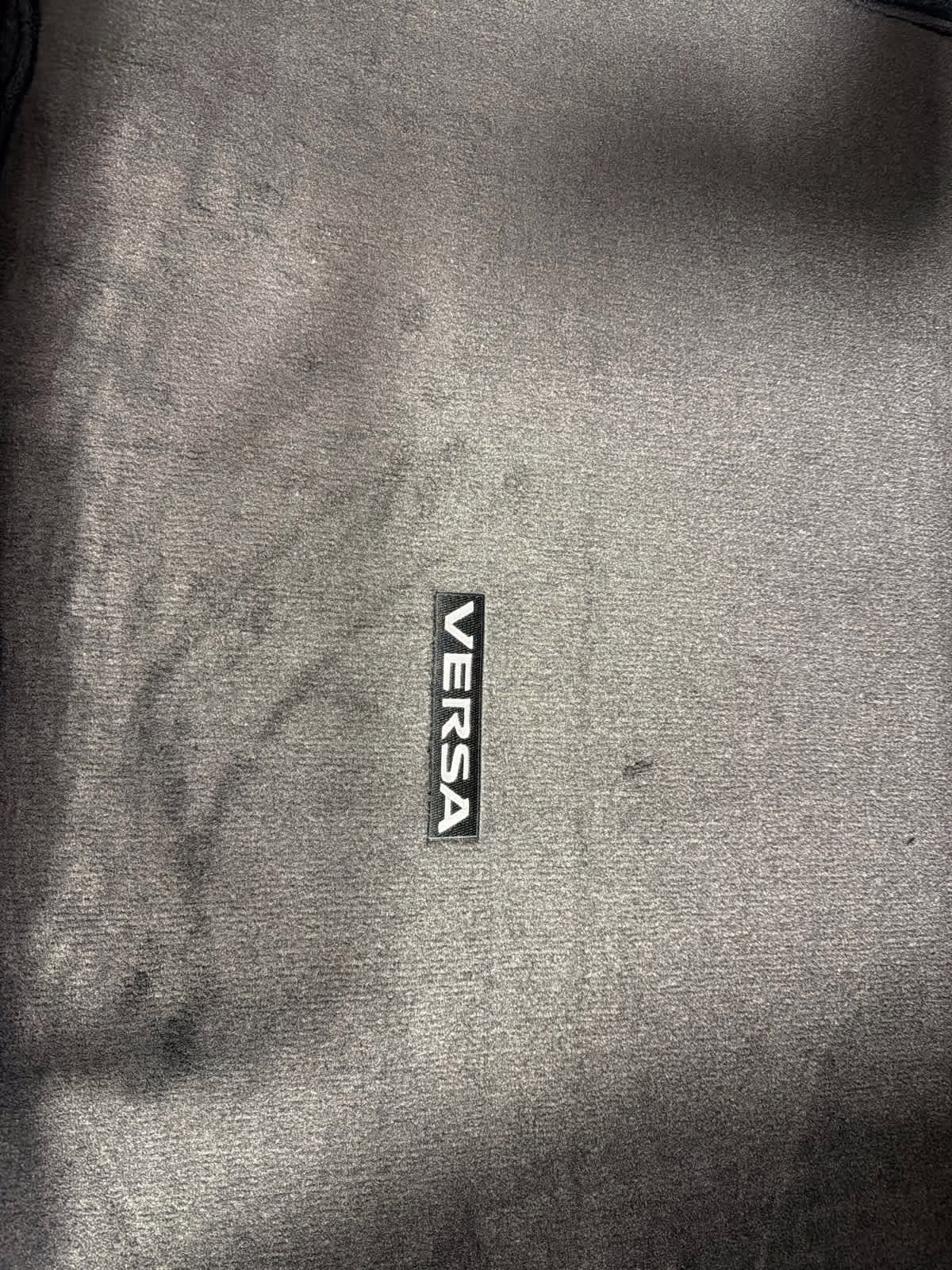 2025 Gray Sky Pearl Nissan Versa SV FWD Sedan