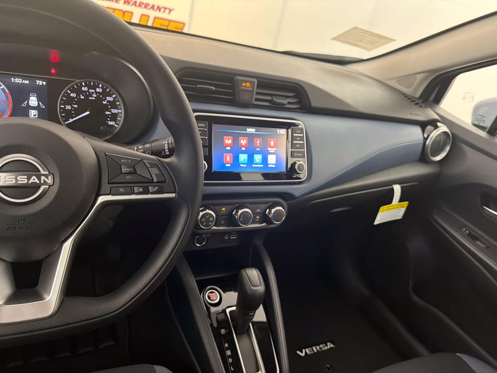 2025 Gray Sky Pearl Nissan Versa SV FWD Sedan