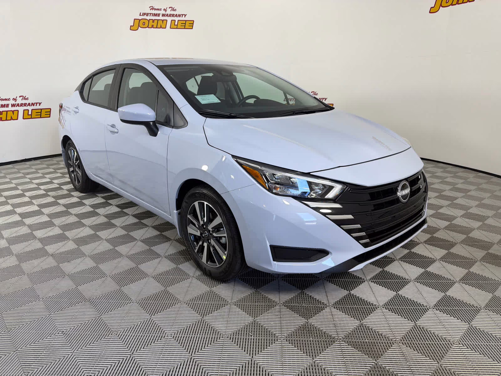 2025 Gray Sky Pearl Nissan Versa SV FWD Sedan