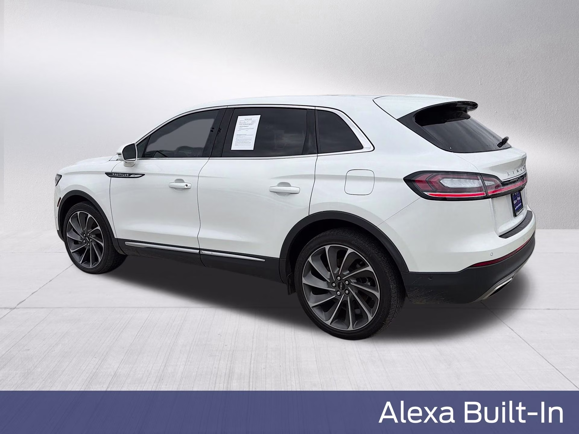 2023 Pristine White Metallic Tri-Coat Lincoln Nautilus Reserve AWD SUV