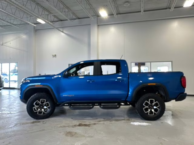 2024 Dynamic Blue Metallic GMC Canyon AT4X 4X4 Truck