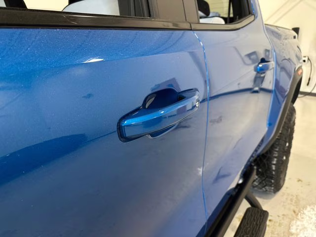 2024 Dynamic Blue Metallic GMC Canyon AT4X 4X4 Truck