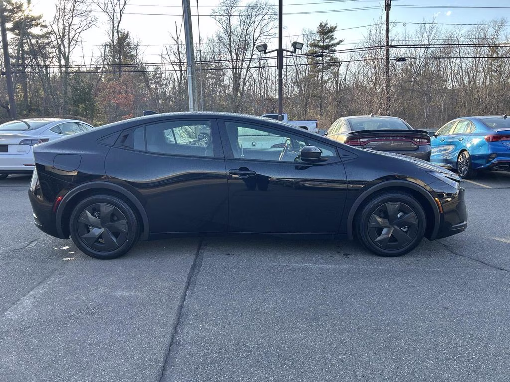 2025 Midnight Black Metallic Toyota Prius Plug-In Hybrid SE FWD Hatchback
