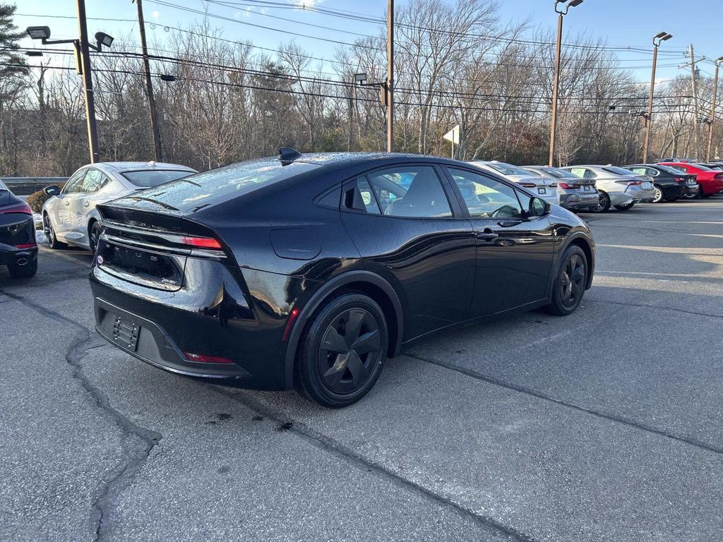 2025 Midnight Black Metallic Toyota Prius Plug-In Hybrid SE FWD Hatchback