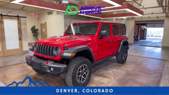 2025 Red Jeep Wrangler 4 Door Rubicon X Sport Utility 4D 4X4