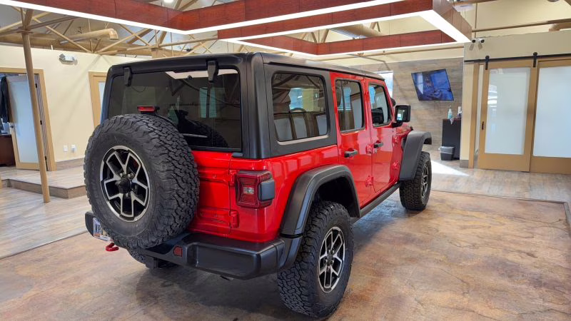 2025 Red Jeep Wrangler 4 Door Rubicon X Sport Utility 4D 4X4